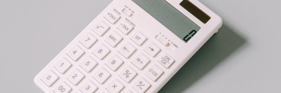 white calculator on white table
