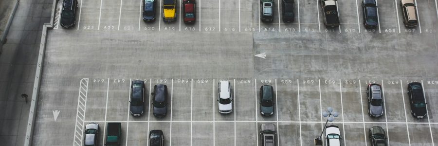 aerial view of cars parked on parking lot